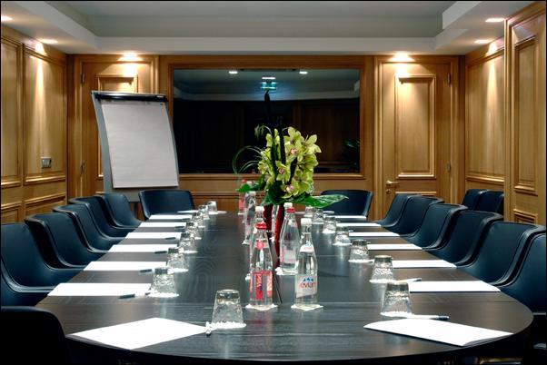 Professional corporate meeting with attendees in a conference setting